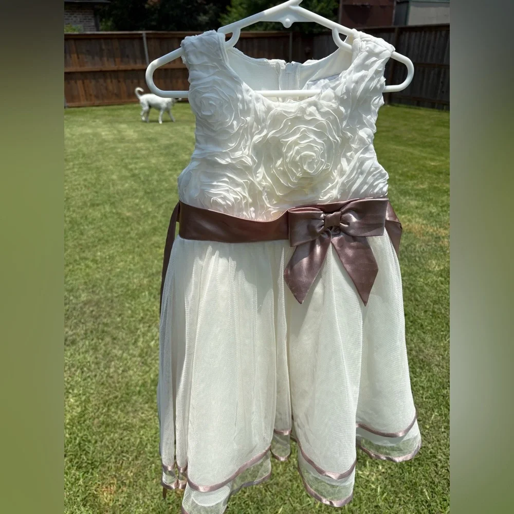 Rare Editions off white with taupe colored sash Size 4 Good used condition